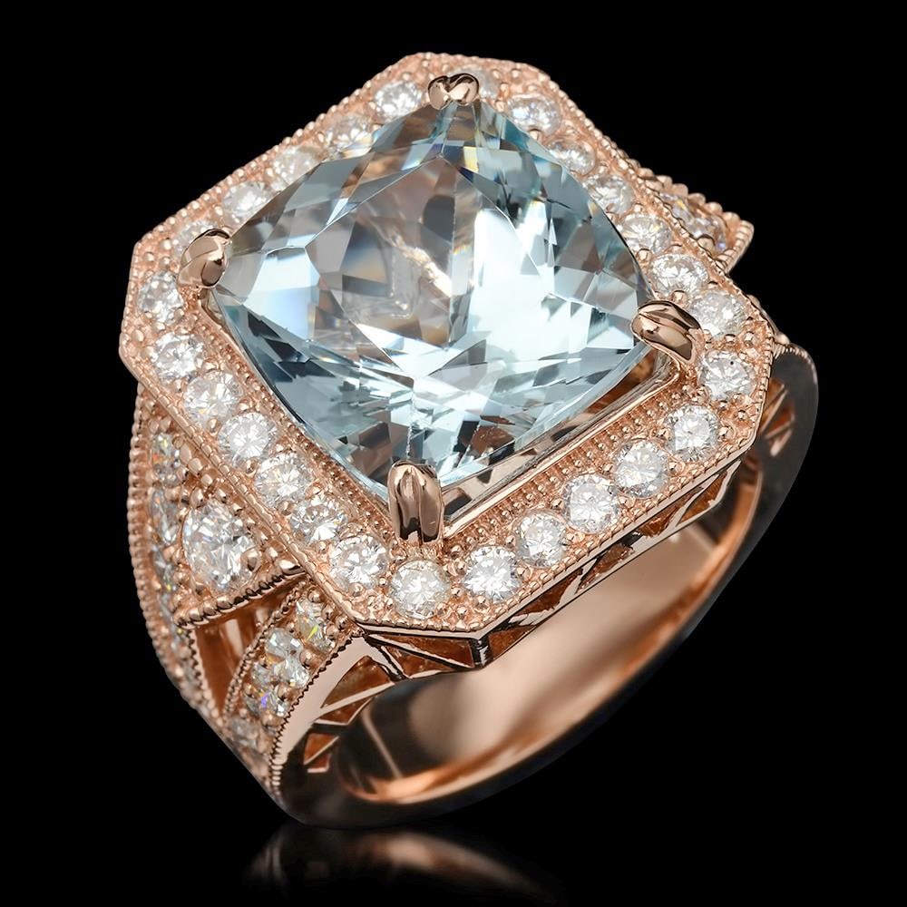 14K Gold 9.48ct Aquamarine & 2.10ct Diamond Ring: Retail: $15,660.00******14K Gold Aquamarine & Diamond Ring ****** Metal: 14K Solid Gold / Total Item Weight: 13.1 grams / Country Made: United States / / Main Stone: Aquamarine / Color: Very Light Blu