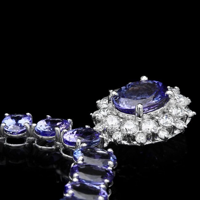 14k Gold 64.5ct Tanzanite 1.60ct Diamond Necklace: Retail: $46,850.00 ****** 14k Gold 64.5ct Tanzanite 1.60ct Diamond Necklace ****** Metal: 14k Solid White Gold / Size: 16.5 / Total Item Weight: 40 grams / Country Made: United States / / Main Stone:
