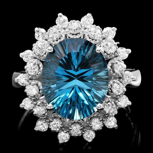14k White Gold 5.50ct Topaz 0.70ct Diamond Ring: Retail: $5,800.00 ****** 14k White Gold 5.50ct Topaz 0.70ct Diamond Ring ****** Metal: 14k Solid White Gold / Size: 7.5 / Total Item Weight: 5.8 grams / Country Made: United States / / Main Stone: Top