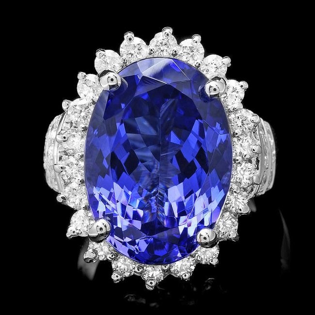 18k Gold 14.00ct Tanzanite 1.50ct Diamond Ring: Retail: $52,600.00 ****** 18k Gold 14.00ct Tanzanite 1.50ct Diamond Ring ****** Metal: 18k Solid White Gold / Size: 7.75 / Total Item Weight: 14.0 grams / Country Made: United States / / Main Stone: T