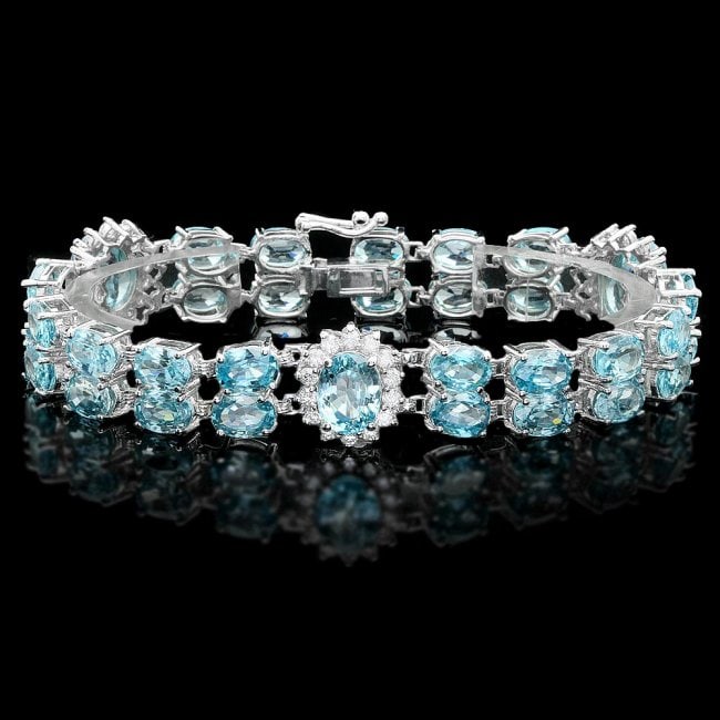 14k Gold 44.5ct Zircon 1.50ct Diamond Bracelet: Retail: $22,800.00 ****** 14k Gold 44.5ct Zircon 1.50ct Diamond Bracelet ****** Metal: 14k Solid White Gold / Size: 7 / Total Item Weight: 27.5 grams / Country Made: United States / / Main Stone: Zirc
