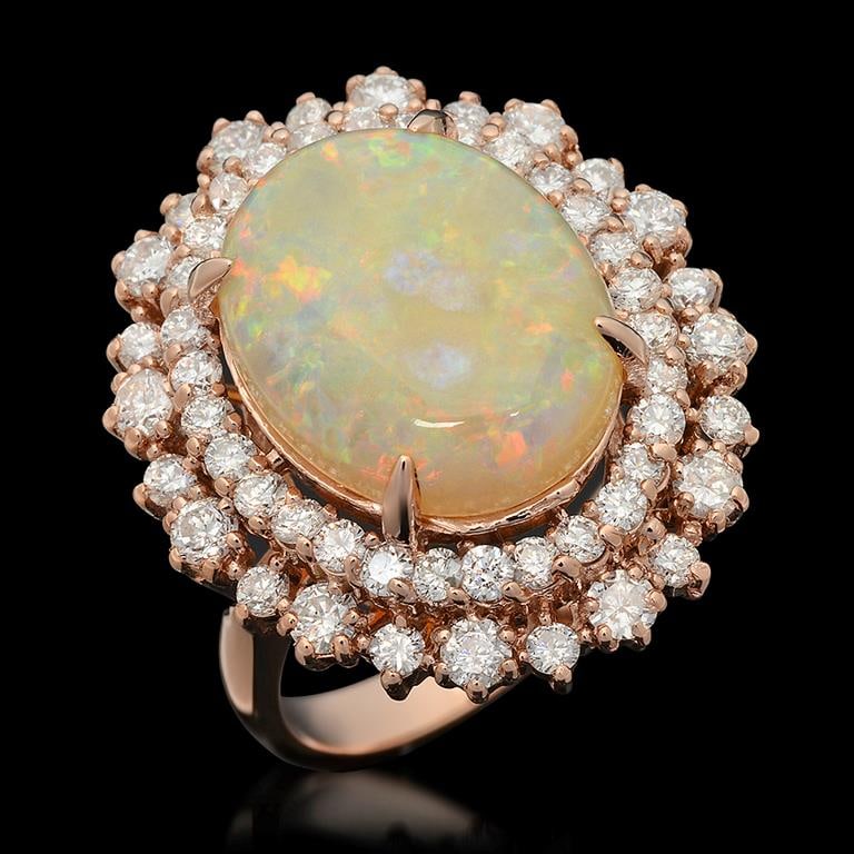 14K Gold 5.91ct Opal 1.85ct Diamond Ring: Retail: $12,860.00 ******14K Gold Opal & Diamond Ring ****** Metal: 14K Solid Rose Gold / Total Item Weight: 9.4 grams / Country Made: United States / / Main Stone: Opal/ Color: Play of Color / Carat