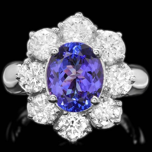 14k Gold 3.00ct Tanzanite 2.50ct Diamond Ring: Retail: $12,700.00 ****** 14k Gold 3.00ct Tanzanite 2.50ct Diamond Ring ****** Metal: 14k Solid White Gold / Size: 6.5 / Total Item Weight: 8.0 grams / / Main Stone: Tanzanite / Color: Purple /