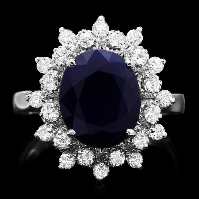 14k Gold 4.00ct Sapphire 0.70ct Diamond Ring: Retail: $3,300.00 ****** 14k Gold 4.00ct Sapphire 0.70ct Diamond Ring ****** Metal: 14k Solid White Gold / Size: 7 / Total Item Weight: 4.6 grams / Country Made: United States / / Main Stone: Sapphire