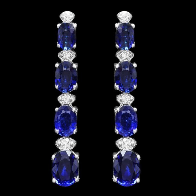 14k Gold 6.50ct Sapphire 0.30ct Diamond Earrings: Retail: $7,200.00 ****** 14k Gold 6.50ct Sapphire 0.30ct Diamond Earrings ****** Metal: 14k Solid White Gold / Total Item Weight: 5 grams / Country Made: United States / / Main Stone: Sapphire / Color