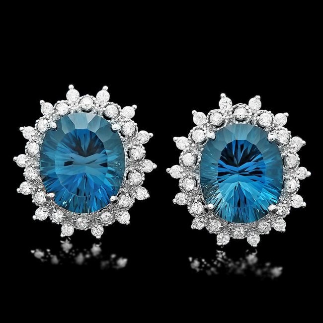 14k Gold 17.00ct Topaz 1.40ct Diamond Earrings: Retail: $10,900.00 ****** 14k Gold 17.00ct Topaz 1.40ct Diamond Earrings ****** Metal: 14k Solid White Gold / Total Item Weight: 10.0 grams / Country Made: United States / / Main Stone: Topaz / Color: