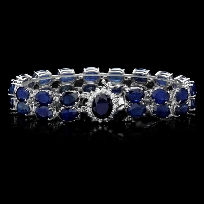 14k Gold 49.5ct Sapphire 0.65ct Diamond Bracelet: Retail: $20,900.00 ****** 14k Gold 49.5ct Sapphire 0.65ct Diamond Bracelet ****** Metal: 14k Solid White Gold / Size: 7 / Total Item Weight: 26.0 grams / Country Made: United States / / Main Stone: Sa
