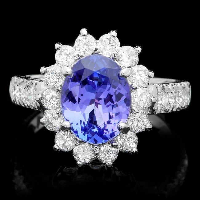 14k Gold 2.00ct Tanzanite 1.25ct Diamond Ring: Retail: $9,330.00 ****** 14k Gold 2.00ct Tanzanite 1.25ct Diamond Ring ****** Metal: 14k Solid White Gold / Total Item Weight: 5.0 grams / Country Made: United States / / Main Stone: Tanzanite / Color