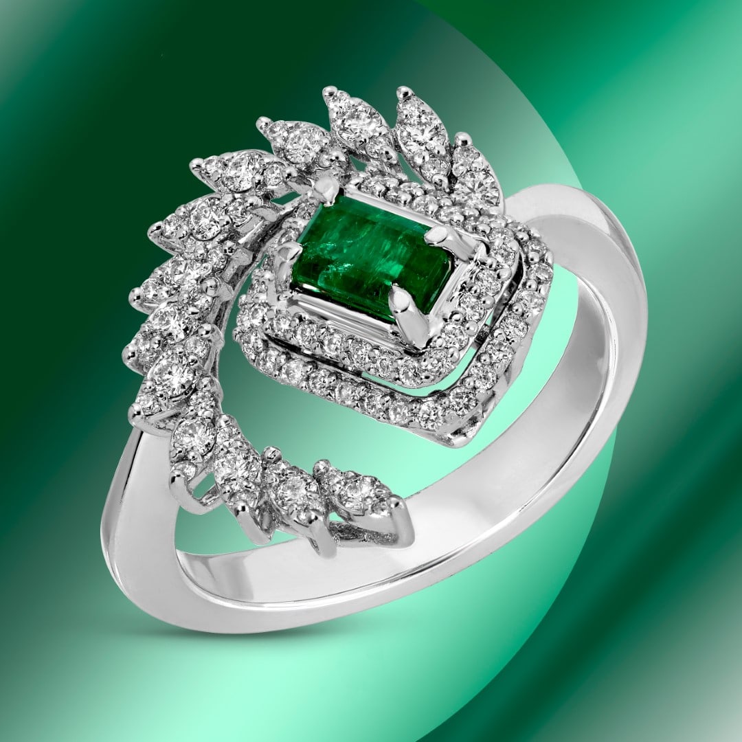 14k Gold 2.00ctc Emerald & 0.57ctc Diamond Ring: Retail: $7,680*****14k Gold Emerald & Diamond Ring*****Metal: 14K White Gold/ Total Wt.:5.9g / Country Made US// Main Stone: Emerald / Carat Total Wt.: 0.57cts / Treatment: None/ Color: Green / Cut: V