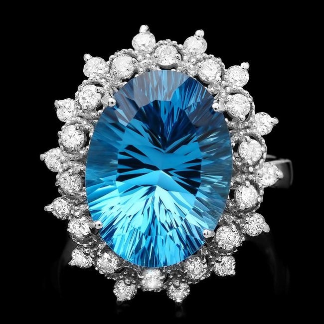 14k White Gold 8.40ct Topaz 0.70ct Diamond Ring: Retail: $6,500.00 ****** 14k White Gold 8.40ct Topaz 0.70ct Diamond Ring ****** Metal: 14k Solid White Gold / Size: 7 / Total Item Weight: 6.3 grams / Country Made: United States / / Main Stone: Topaz
