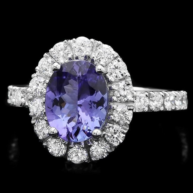 14k Gold 1.82ct Tanzanite 0.92ct Diamond Ring: Retail: $8,000.00 ****** 14k Gold 1.82ct Tanzanite 0.92ct Diamond Ring ****** Metal: 14k Solid White Gold / Total Item Weight: 4.2 grams / Country Made: United States / / Main Stone: Tanzanite / Color
