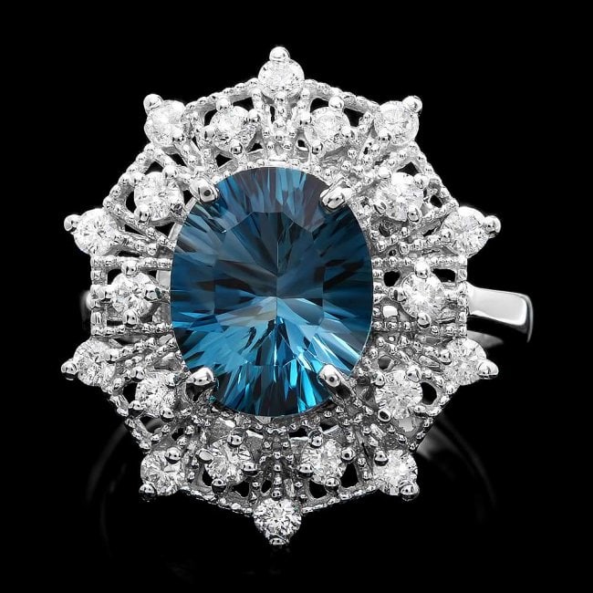 14k White Gold 4.00ct Topaz 0.70ct Diamond Ring: Retail: $5,500.00 ****** 14k White Gold 4.00ct Topaz 0.70ct Diamond Ring ****** Metal: 14k Solid White Gold / Size: 8 / Total Item Weight: 6.00 grams / Country Made: United States / / Main Stone: Topa