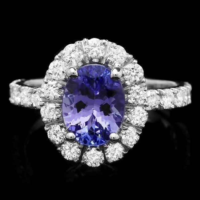 14k Gold 1.71ct Tanzanite 1.06ct Diamond Ring: Retail: $7,800.00 ****** 14k Gold 1.71ct Tanzanite 1.06ct Diamond Ring ****** Metal: 14k Solid White Gold / Size: 7 / Total Item Weight: 4.2 grams / Country Made: United States / / Main Stone: Tanzani