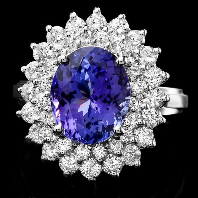 14k Gold 3.77ct Tanzanite 1.58ct Diamond Ring: Retail: $12,890.00 ****** 14k Gold 3.77ct Tanzanite 1.58ct Diamond Ring ****** Metal: 14k Solid White Gold / Size: 7 / Total Item Weight: 6.8 grams / Country Made: United States / / Main Stone: Tanzan