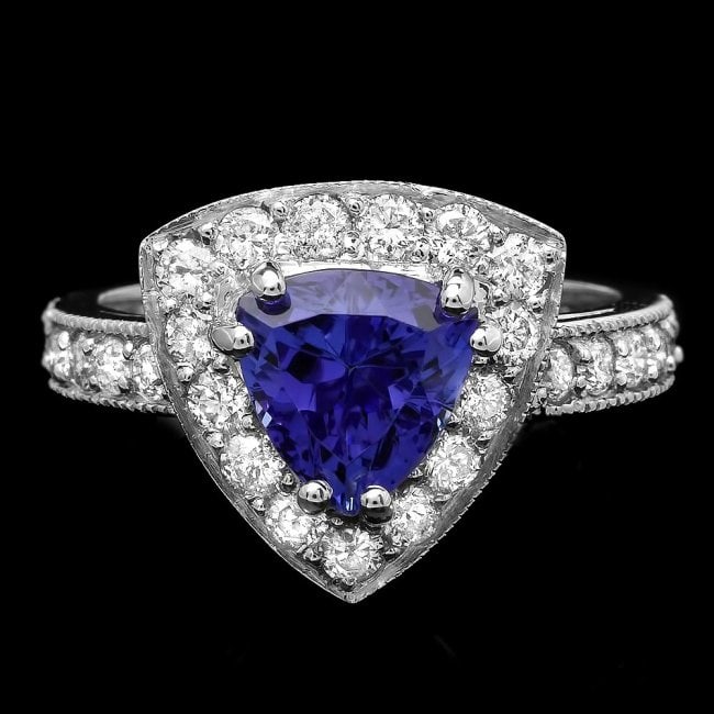 14k Gold 2.00ct Tanzanite 1.00ct Diamond Ring: Retail: $5,900.00 ****** 14k Gold 2.00ct Tanzanite 1.00ct Diamond Ring ****** Metal: 14k Solid White Gold / Size: 6.75 / Total Item Weight: 4.7 grams / Country Made: United States / / Main Stone: Tanz