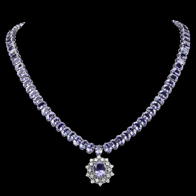 14k Gold 65.5ct Tanzanite 1.00ct Diamond Necklace: Retail: $48,600.00 ****** 14k Gold 65.5ct Tanzanite 1.00ct Diamond Necklace ****** Metal: 14k Solid White Gold / Size: 16.5 / Total Item Weight: 40.3 grams / Country Made: United States / / Main Stone