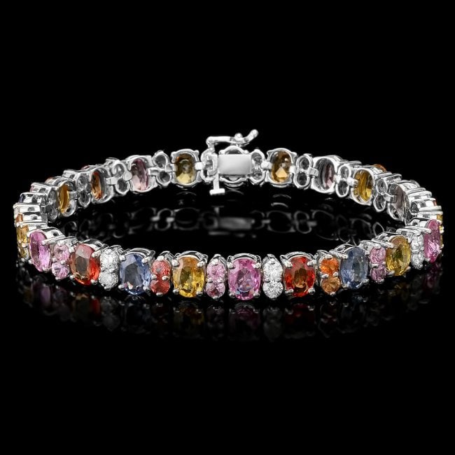 14k Gold 23ct Sapphire 1.60ct Diamond Bracelet: Retail: $18,300.00 ****** 14k Gold 23ct Sapphire 1.60ct Diamond Bracelet ****** Metal: 14k Solid White Gold / Size: 7.5 / Total Item Weight: 24.5 grams / Country Made: United States / / Main Stone: Sa