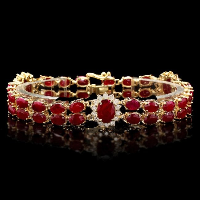 14k Gold 31.5ct Ruby 1.70ct Diamond Bracelet: Retail: $23,670.00 ****** 14k Gold 31.5ct Ruby 1.70ct Diamond Bracelet ****** Metal: 14k Solid Yellow Gold / Size: 7 / Total Item Weight: 22.0 grams / Country Made: United States / / Main Stone: Ruby