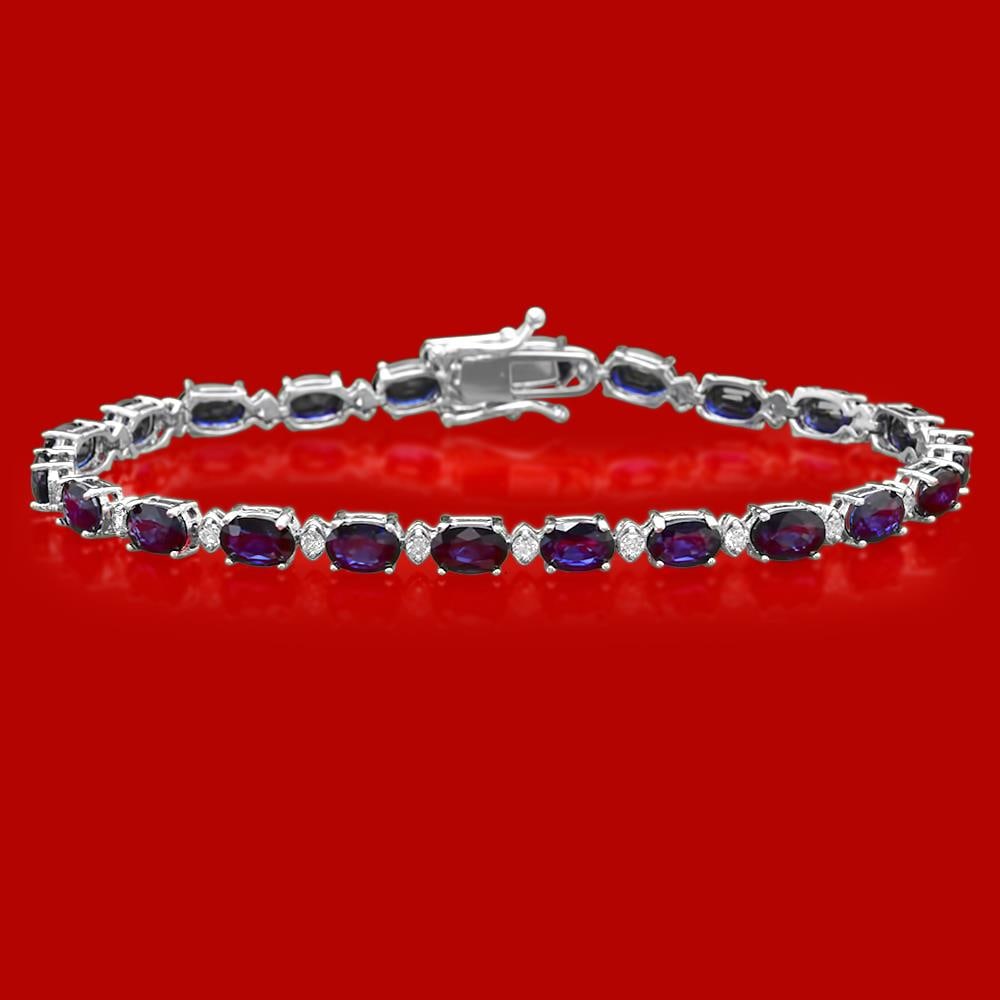14k Gold 12.43ct Sapphire 0.71ct Diamond Bracelet: Retail: $7,450.00 ****** 14k Gold 12.43 Sapphire 0.71ct Diamond Bracelet ****** Metal: 14k Solid White Gold / Size: 7 / Total Item Weight: 9.4 grams / Country Made: United States / / Main Stone: Sapph