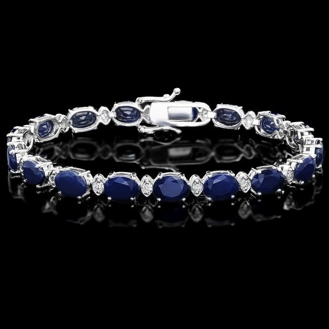 14k Gold 25ct Sapphire 0.80ct Diamond Bracelet: Retail: $16,350.00 ****** 14k Gold 25ct Sapphire 0.80ct Diamond Bracelet ****** Metal: 14k Solid White Gold / Size: 7.5 / Total Item Weight: 17.5 grams / Country Made: United States / / Main Stone: Sa