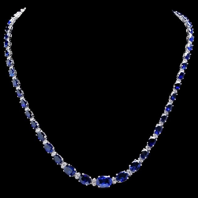 14k Gold 32.50ct Sapphire 1.55ct Diamond Necklace: Retail: $19,000.00 ****** 14k Gold 32.50ct Sapphire 1.55ct Diamond Necklace ****** Metal: 14k Solid White Gold / Size: 17.5 / Total Item Weight: 23.0 grams / / Main Stone: Sapphire / Color: Blue / Car