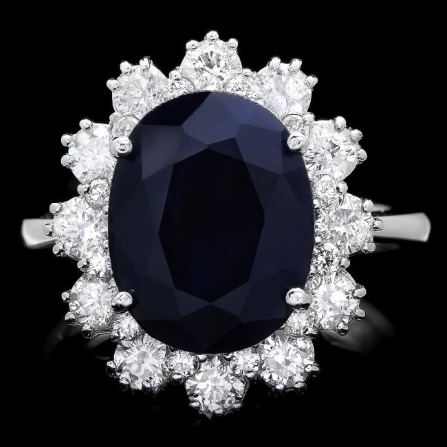 14k Gold 6.00ct Sapphire 1.35ct Diamond Ring: Retail: $5,800.00 ****** 14k Gold 6.00ct Sapphire 1.35ct Diamond Ring ****** Metal: 14k Solid White Gold / Total Item Weight: 6.0 grams / / Main Stone: Sapphire / Color: Blue / Carat Total Weight: 6.0
