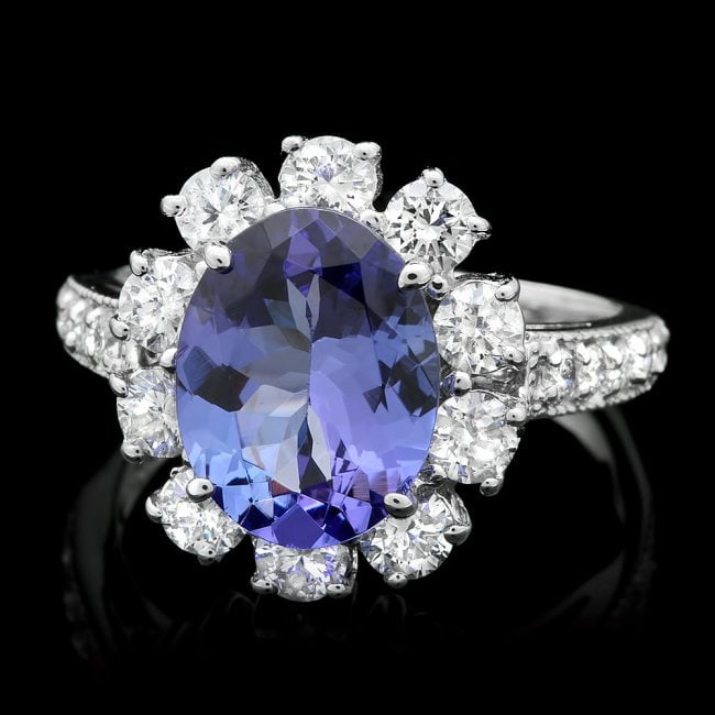 14k Gold 3.00ct Tanzanite 1.40ct Diamond Ring: Retail: $11,750.00 ****** 14k Gold 3.00ct Tanzanite 1.40ct Diamond Ring ****** Metal: 14k Solid White Gold / Size: 7 / Total Item Weight: 5.5 grams / Country Made: United States / / Main Stone: Tanzan