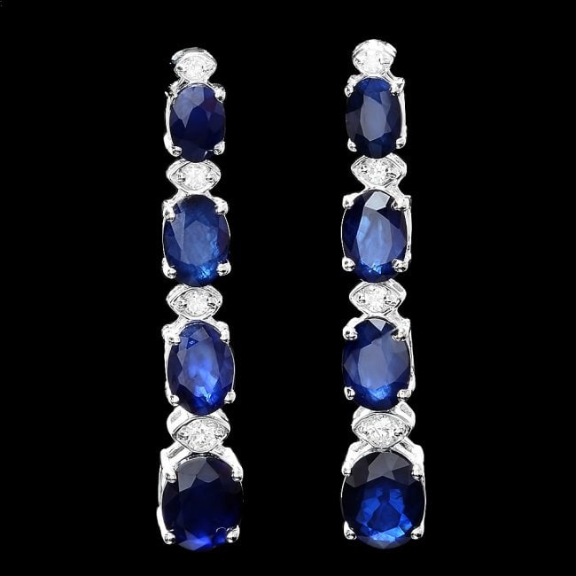 14k Gold 8ct Sapphire 0.30ct Diamond Earrings: Retail: $6,900.00 ****** 14k Gold 8ct Sapphire 0.30ct Diamond Earrings ****** Metal: 14k Solid White Gold / Total Item Weight: 5.0 grams / Country Made: United States / / Main Stone: Sapphire / Color: