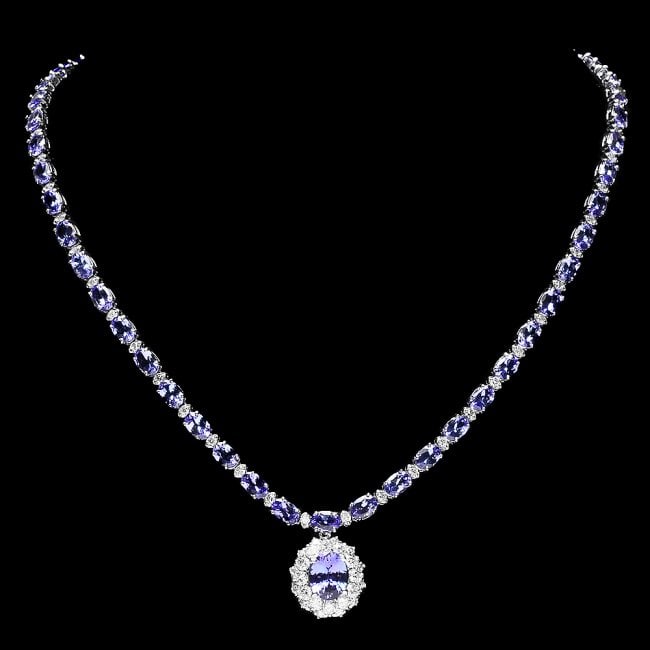 14k Gold 25.5ct Tanzanite 3.00ct Diamond Necklace: Retail: $23,200.00 ****** 14k Gold 25.5ct Tanzanite 3.00ct Diamond Necklace ****** Metal: 14k Solid White Gold / Size: 16.75 / Total Item Weight: 26.5 grams / Country Made: United States / / Main Ston