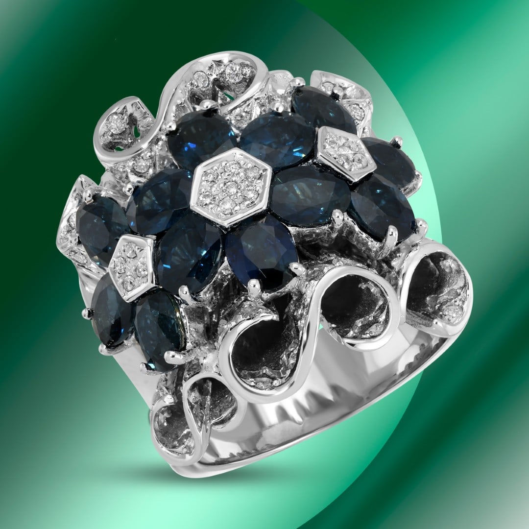 14K Gold 5.22cts Sapphire & 0.31cts Diamond Ring: Retail: $17,985*****14K Gold Sapphire & Diamond Ring*****Metal: 14K White Gold/ Total Wt.: 19.6g / Country Made US// Main Stone: Sapphire / Carat Total Wt.: 5.22cts / Treatment: Diffusion / Color: Blu