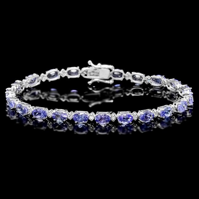 14k Gold 10ct Tanzanite 0.40ct Diamond Bracelet: Retail: $7,800.00 ****** 14k Gold 10ct Tanzanite 0.40ct Diamond Bracelet ****** Metal: 14k Solid White Gold / Size: 7.5 / Total Item Weight: 9.0 grams / Country Made: United States / / Main Stone: Tan