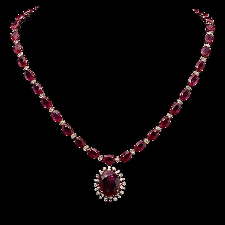 14K Gold 67.60ct Ruby & 2.55ct Diamond Necklace: Retail: $32,240.00******14K Gold Ruby & Diamond Necklace ****** Metal: 14K Solid Rose Gold / Total Item Weight: 39.7 grams/ Country Made: United States / / Main Stone: Ruby / Color: Red / Carat Total