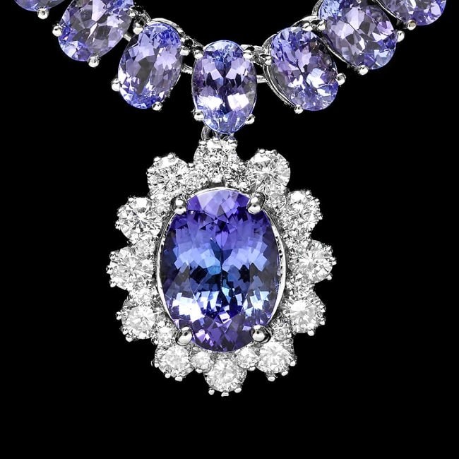 14k Gold 49ct Tanzanite 1.50ct Diamond Necklace: Retail: $32,900.00 ****** 14k Gold 49ct Tanzanite 1.50ct Diamond Necklace ****** Metal: 14k Solid White Gold / Size: 17 / Total Item Weight: 32.5 grams / Country Made: United States / / Main Stone: Ta
