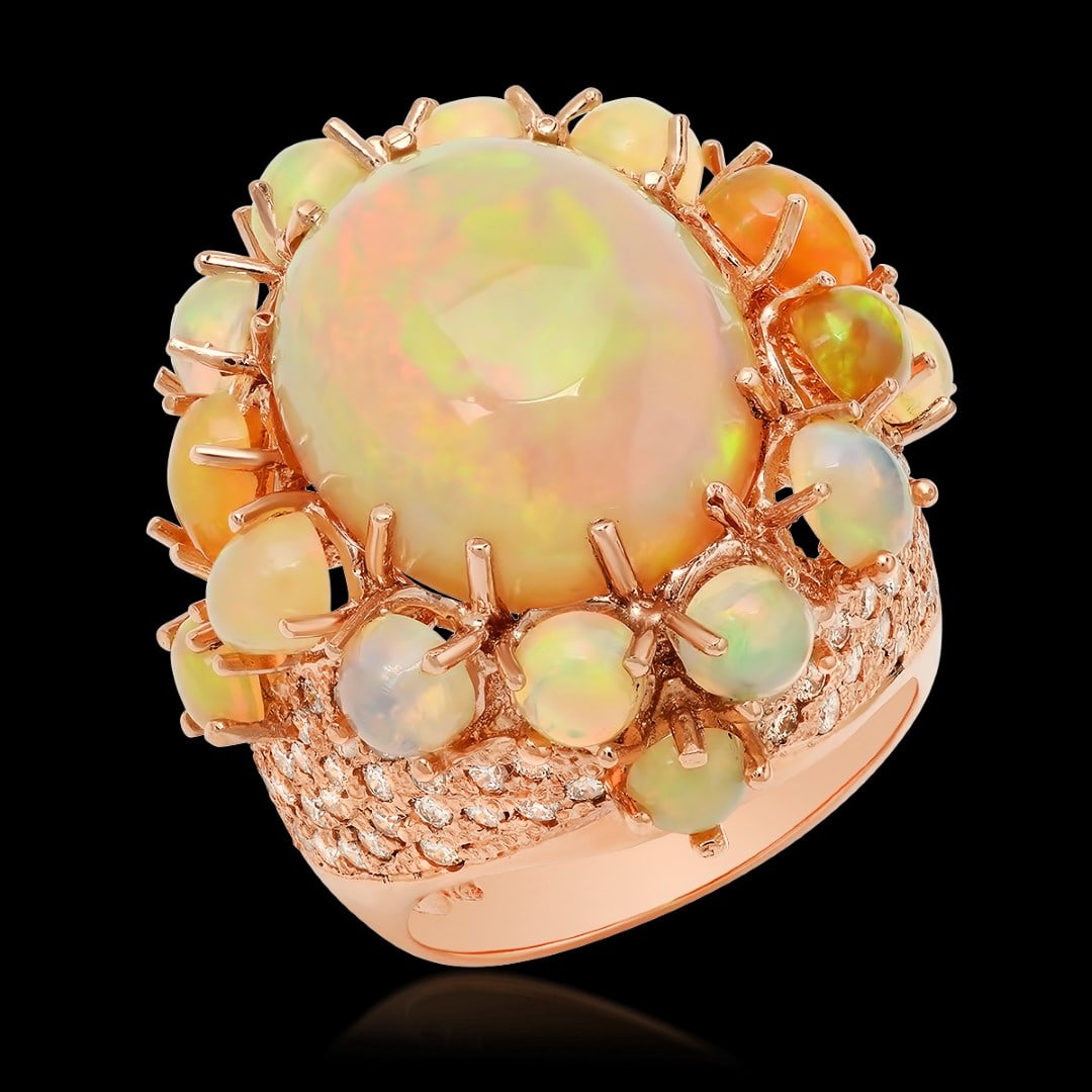 14K Rose Gold, 13.00cts Opal, 2.20cts Diamond Ring: Retail: $27,620.00****** 14K Rose Gold, 13.00cts Opal, 2.20cts Diamond Ring******* Metal: 14K Rose Gold/ Country Made USA// Main Stone: Opal/ Adjacent Stone: Diamond/ Main Stone Wt.: 13.00cts/ Adjacen
