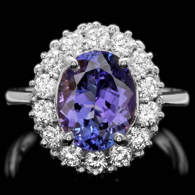 14k Gold 4.00ct Tanzanite 1.00ct Diamond Ring: Retail: $9,800.00 ****** 14k Gold 4.00ct Tanzanite 1.00ct Diamond Ring ****** Metal: 14k Solid White Gold / Size: 7.25 / Total Item Weight: 5.5 grams / / Main Stone: Tanzanite / Color: Purple / Carat