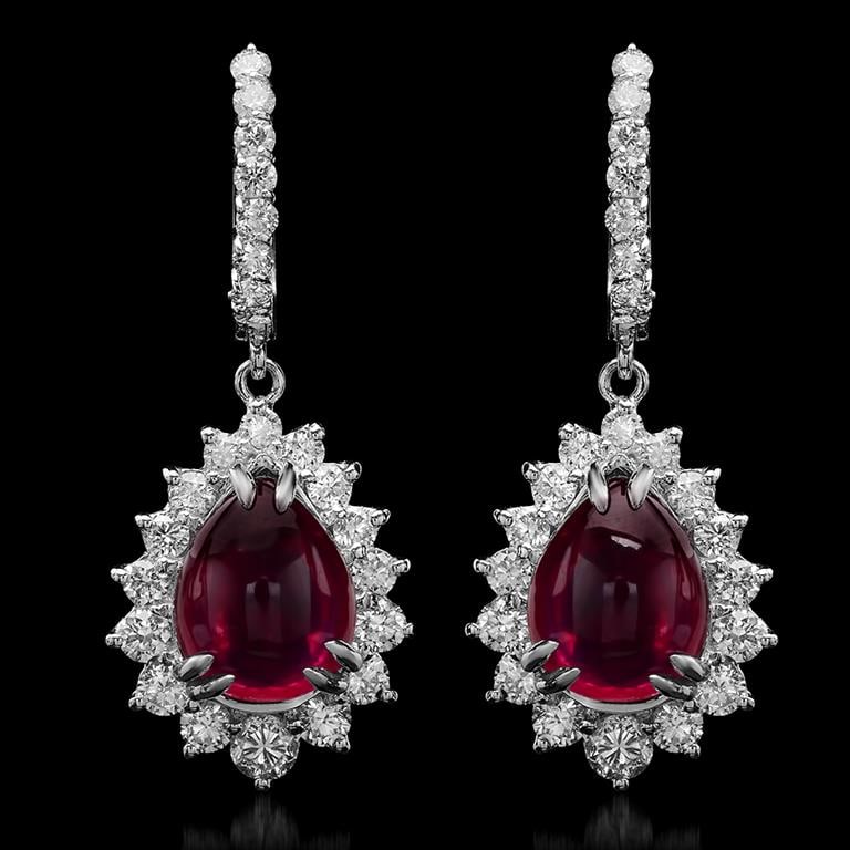 14K Gold 10.89ct Ruby 2.43ct Diamond Earrings: Retail: $12,550.00******14K Gold Ruby & Diamond Earrings ****** Metal: 14K Solid White Gold / Total Item Weight: 11.2 grams / Country Made: United States / / Main Stone: Ruby / Color: Red / Carat Tota