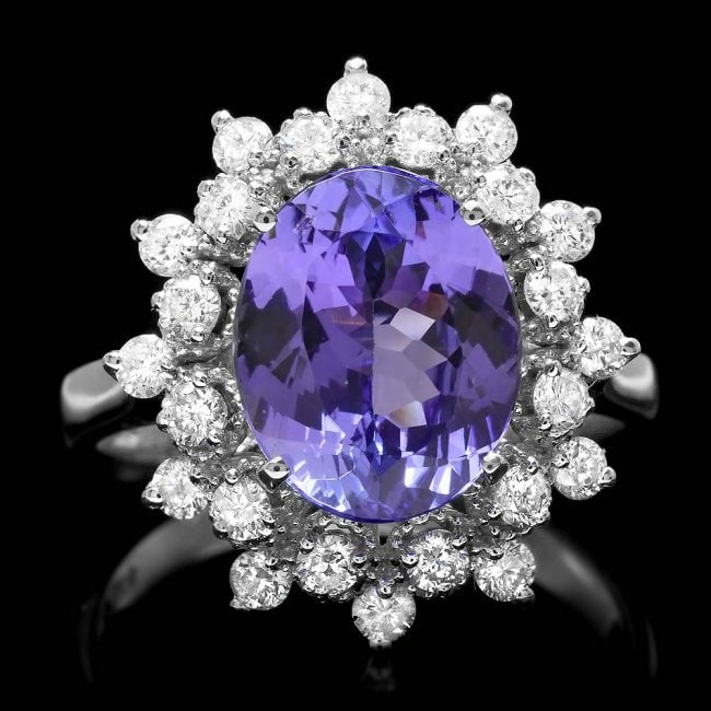 14k Gold 3.50ct Tanzanite 0.75ct Diamond Ring: Retail: $8,300.00 ****** 14k Gold 3.50ct Tanzanite 0.75ct Diamond Ring ****** Metal: 14k Solid White Gold / Size: 7 / Total Item Weight: 4.0 grams / Country Made: United States / / Main Stone: Tanzani
