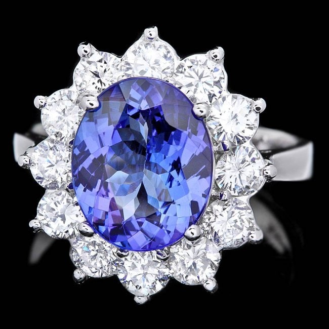 14k Gold 3.50ct Tanzanite 1.70ct Diamond Ring: Retail: $14,700.00 ****** 14k Gold 3.50ct Tanzanite 1.70ct Diamond Ring ****** Metal: 14k Solid White Gold / Size: 7 / Total Item Weight: 5.5 grams / Country Made: United States / / Main Stone: Tanzan