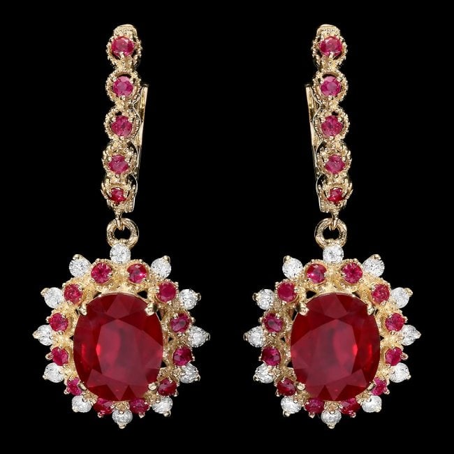 14k Gold 8.2ct Ruby 0.65ct Diamond Earrings: Retail: $8,800.00 ****** 14k Gold 8.2ct Ruby 0.65ct Diamond Earrings ****** Metal: 14k Solid Yellow Gold / Total Item Weight: 8 grams / Country Made: United States / / Main Stone: Ruby / Color: Red