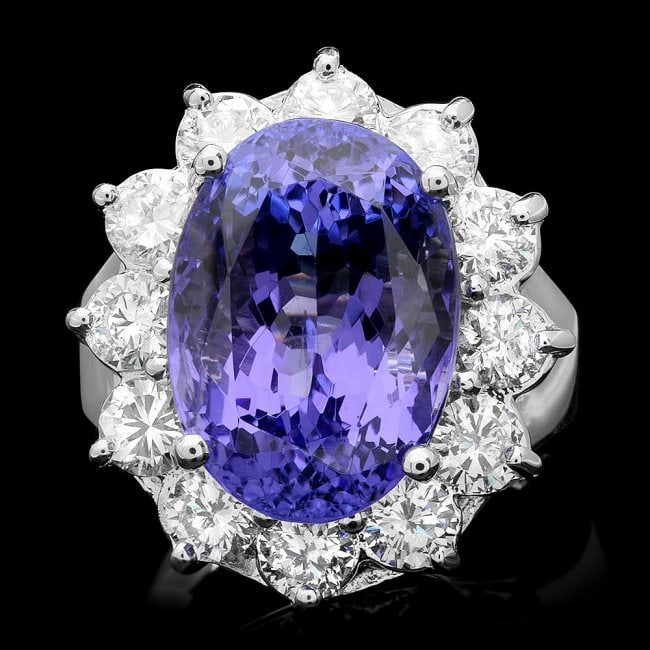 14k Gold 11.50ct Tanzanite 2.10ct Diamond Ring: Retail: $43,800.00 ****** 14k Gold 11.50ct Tanzanite 2.10ct Diamond Ring ****** Metal: 14k Solid White Gold / Size: 7 / Total Item Weight: 11.5 grams / Country Made: United States / / Main Stone: Tanz