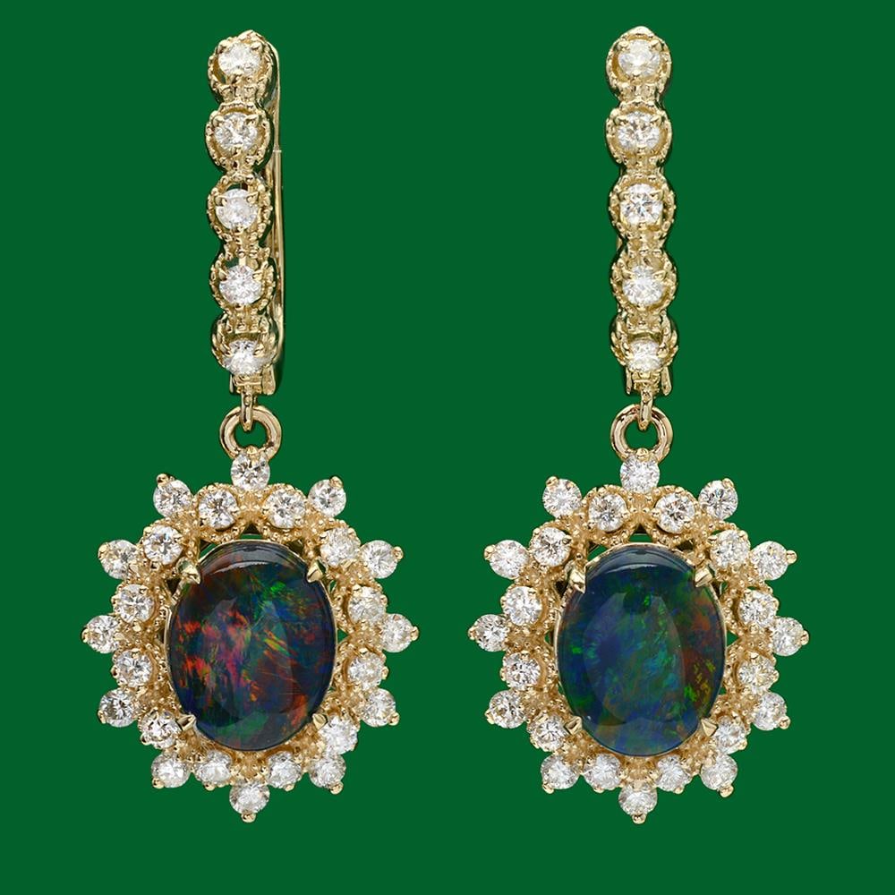 14k Gold 3.62ct Opal 1.60ct Diamond Earrings: Retail: $6,900.00 ****** 14k Gold 3.62ct Opal 1.60ct Diamond Earrings ****** Metal: 14k Solid Yellow Gold / Total Item Weight: 7.8 grams / Country Made: United States / / Main Stone: Opal / Color: Pla
