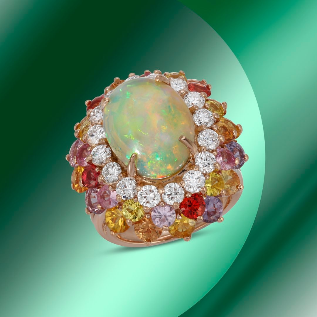 14K Gold 6.88cts Opal, 7.67cts Sapphire & 1.64cts Diamond Ring: Retail: $19,437***** 14K Gold 6.88cts Opal, 7.67cts Sapphire & 1.64cts Diamond Ring****** Metal: 14K Rose Gold/ Total Wt.: 11.9g/ Country Made USA// Main Stone: Opal/ Carat Total Wt: 6.88cts / Treatme