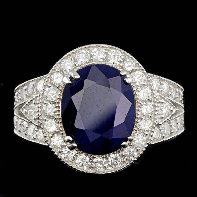 14k Gold 6.50ct Sapphire 1.60ct Diamond Ring: Retail: $14,600.00 ****** 14k Gold 6.50ct Sapphire 1.60ct Diamond Ring ****** Metal: 14k Solid White Gold / Size: 7.25 / Total Item Weight: 9.0 grams / Country Made: United States / / Main Stone: Sapp
