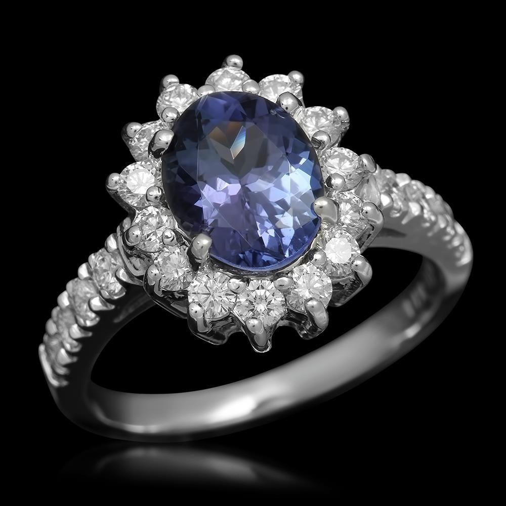 14K Gold 1.80ct Tanzanite 0.79ct Diamond Ring: Retail: $5,638.00 ****** 14K Gold 1.80ct Tanzanite 0.79ct Diamond Ring ****** Metal: 14K Solid Gold / Total Item Weight: 4.2 grams / Country Made: United States / / Main Stone: Tanzanite / Color: Viol