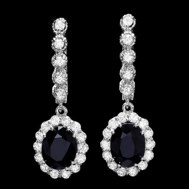 14k Gold 4ct Sapphire 1.35ct Diamond Earrings: Retail: $9,975.00 ****** 14k Gold 4ct Sapphire 1.35ct Diamond Earrings ****** Metal: 14k Solid White Gold / Total Item Weight: 5.5 grams / Country Made: United States / / Main Stone: Sapphire / Color: