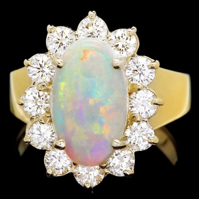 14k Yellow Gold 2.00ct Opal 1.30ct Diamond Ring: Retail: $8,900.00 ****** 14k Yellow Gold 2.00ct Opal 1.30ct Diamond Ring ****** Metal: 14k Solid Yellow Gold / Size: 7.25 / Total Item Weight: 6.0 grams / Country Made: United States / / Main Stone: O