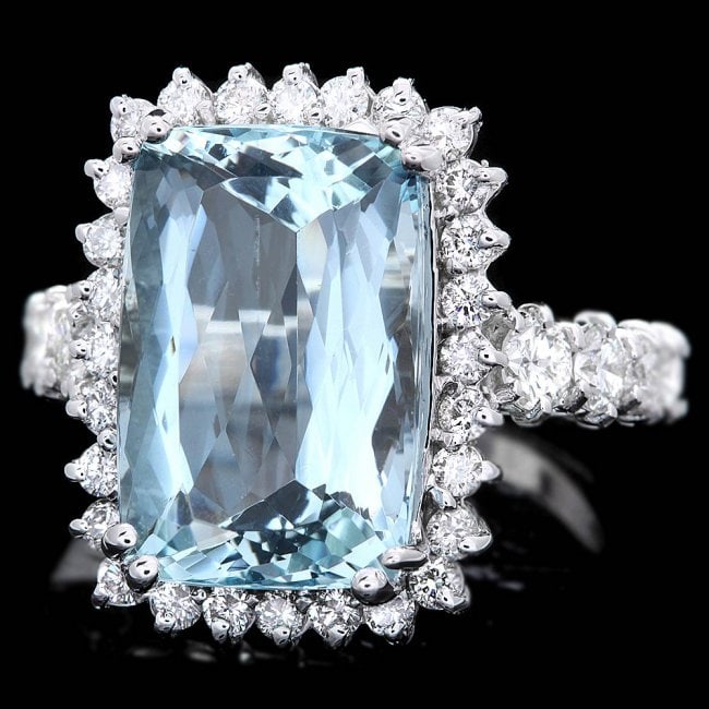 14k Gold 7ct Aquamarine 1.40ct Diamond Ring: Retail: $9,500.00****** 14k Gold 7ct Aquamarine 1.40ct Diamond Ring ****** Metal: 14k Solid White Gold / Size: 7 / Total Item Weight: 8.0 grams / Country Made: United States / / Main Stone: Aquamarine