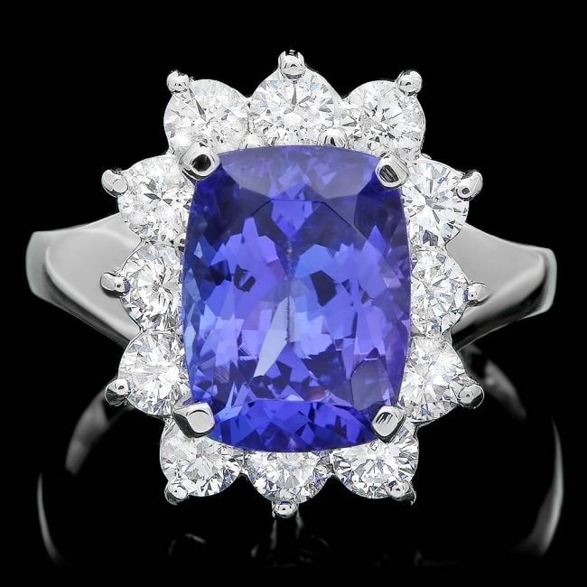 14k Gold 4.00ct Tanzanite 1.20ct Diamond Ring: Retail: $13,260.00 ****** 14k Gold 4.00ct Tanzanite 1.20ct Diamond Ring ****** Metal: 14k Solid White Gold / Size: 7 / Total Item Weight: 5.5 grams / Country Made: United States / / Main Stone: Tanzan
