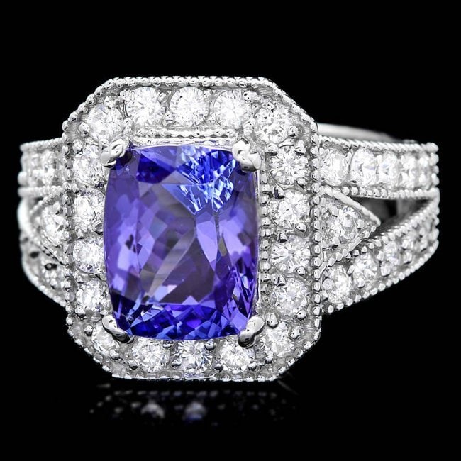14k Gold 4.00ct Tanzanite 1.30ct Diamond Ring: Retail: $12,850.00 ****** 14k Gold 4.00ct Tanzanite 1.30ct Diamond Ring ****** Metal: 14k Solid White Gold / Size: 6.5 / Total Item Weight: 8.5 grams / Country Made: United States / / Main Stone: Tanz