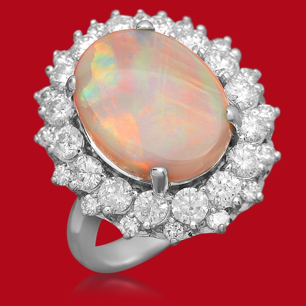 14K Gold 3.87ct Opal 1.80ct Diamond Ring: Retail: $8,532.00 ****** 14K Gold 3.87ct Opal 1.80ct Diamond Ring****** Metal: 14K Solid Gold / Total Item Weight: 8.1 grams / Country Made: United States / / Main Stone: Opal / Color: Play of Color /